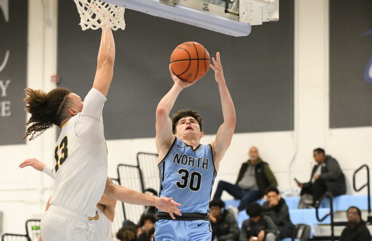 Connor Amundsen (30) goes up for two of his 25 points. 
